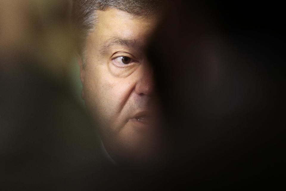 Ukrainian presidential candidate and businessman Petro Poroshenko briefs the media after a meeting with Germany's Christian Union's faction law makers in Berlin, Germany, Wednesday, May 7, 2014. The Ukrainian government is planing a presidential election on May 25, 2014. (AP Photo/Markus Schreiber)
