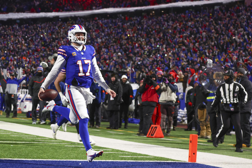 Buffalo Bills quarterback Josh Allen (17) crosses the goal line for a touchdown against the Pittsburgh Steelers during the second quarter of an NFL wild-card playoff football game, Monday, Jan. 15, 2024, in Buffalo, N.Y. (AP Photo/Jeffrey T. Barnes)