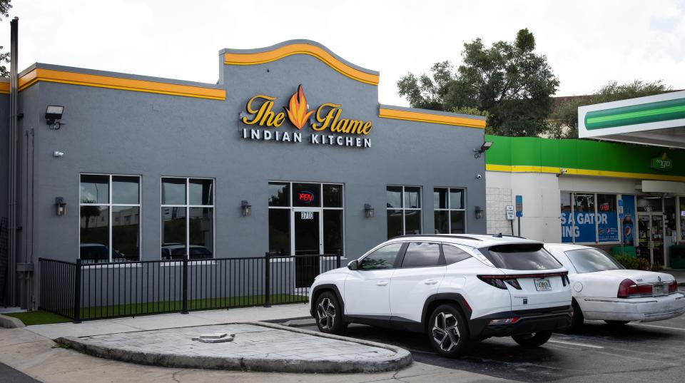 The Flame Indian Kitchen is behind the BP station on College Road (State Road 200) just east of Interstate 75.