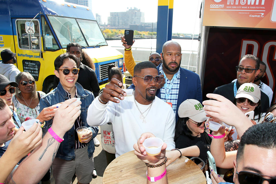 <p>Jamie Foxx participates in a Brown Sugar Bourbon tasting during the New York City Wine & Food Festival at Pier 76 on Oct. 15.</p>