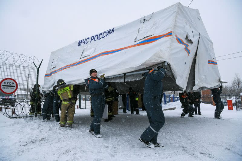 Specialists take part in a rescue operation following a fire in a coal mine in the Kemerovo region