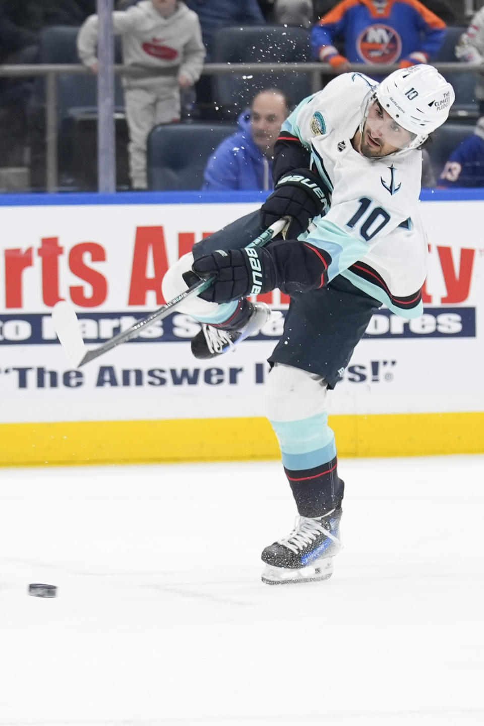 Seattle Kraken's Matty Beniers scores during the first period of an NHL hockey game against the New York Islanders, Tuesday, Feb. 13, 2024, in Elmont, N.Y. (AP Photo/Seth Wenig)