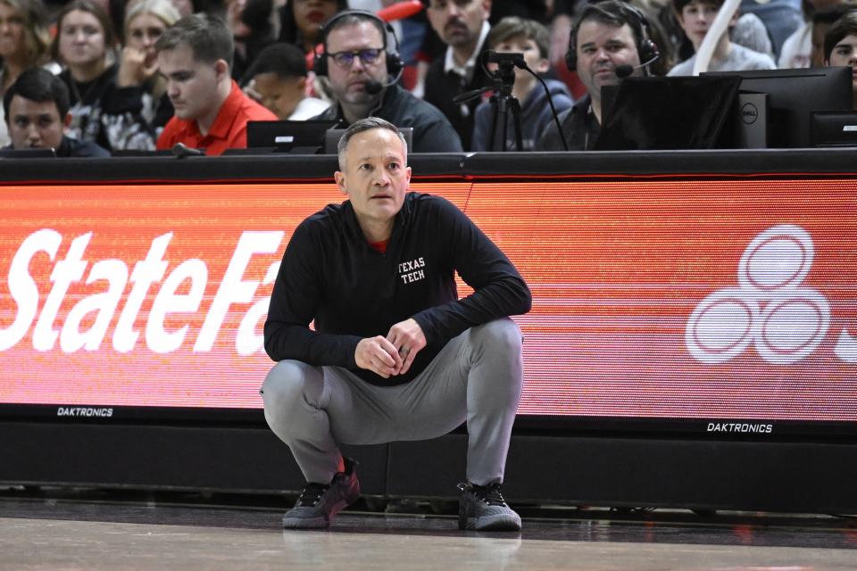 Texas Tech head coach Grant McCasland watches from the sideline during the second half of an NCAA college basketball game against Central Florida, Saturday, Feb. 10, 2024, in Lubbock, Texas. (AP Photo/Justin Rex)