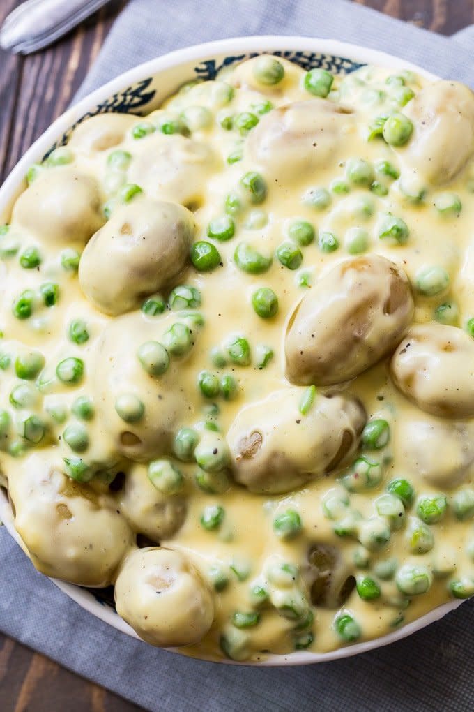 <strong>Get the <a href="https://spicysouthernkitchen.com/cheesy-creamed-peas-and-potatoes/" target="_blank">Cheesy Creamed Peas and Potatoes recipe</a>&nbsp;from&nbsp;Spicy Southern Kitchen</strong>