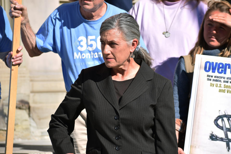 FILE - Democratic U.S. House candidate Monica Tranel listens during a news conference about a potential increase in utility rates, Oct. 19, 2022, in Butte, Mont. Tranel is running unopposed in the primary election, Tuesday, June 4, 2024, as she seeks to challenge Republican U.S. Rep. Ryan Zinke in the November election. (AP Photo/Matthew Brown, File)