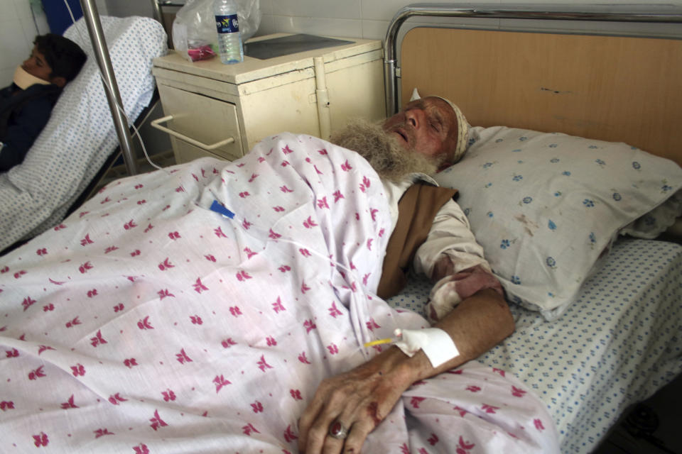 Wounded men receive treatment at a hospital after gunmen stormed a mosque late on Tuesday, killing some worshipers and wounding several others, in Parwan province, north of Kabul, Afghanistan, Wednesday, May 20, 2020. In a second attack, also late Tuesday, a family returning from a mosque was attacked in Khost province and three brothers were killed. No one claimed responsibility for either attack but the Taliban immediately denied they were involved. (AP Photo)