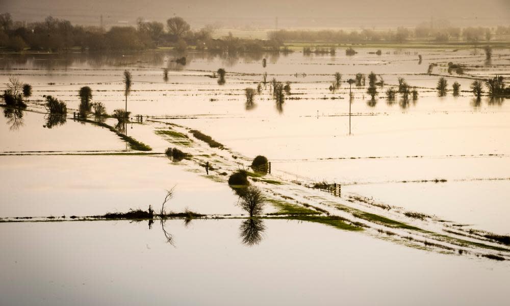 Flood water in Somerset. Southern areas are predicted to receive more funding than northern ones.