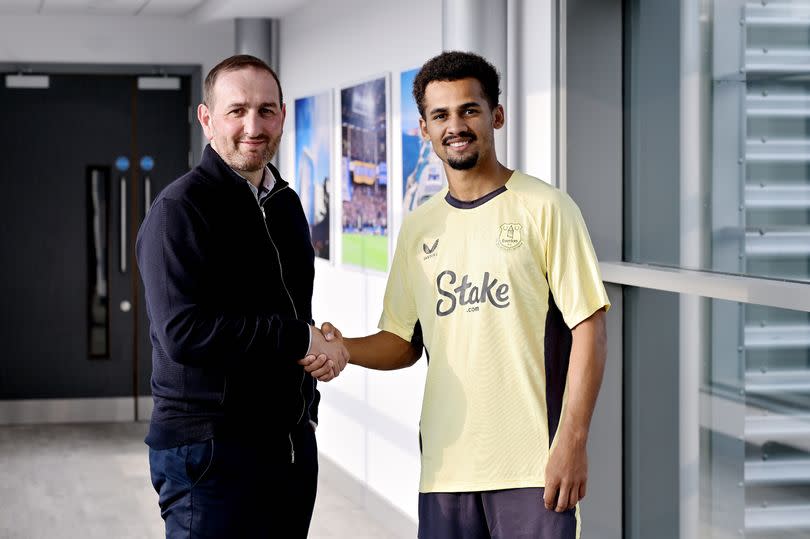 LIVERPOOL, ENGLAND - JULY 01: Iliman Ndiaye poses for a photo with Kevin Thelwell after signing for Everton at Goodison Park on July 01, 2024 in Liverpool, England. (Photo by Tony McArdle/Everton FC)