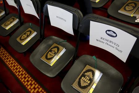 Copies of the Koran sit on chairs, including those reserved for White House staff members, in a room prepared for remarks by U.S. President Barack Obama at the Islamic Society of Baltimore mosque in Catonsville, Maryland February 3, 2016. REUTERS/Jonathan Ernst