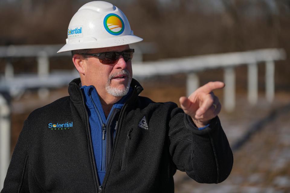 Jim Shaw, president of Carmel-based Solential Energy, gives a tour of a mid-construction 60-acre solar array Wednesday, Feb, 1, 2023, in rural Danville, Ind. The farm will harvest sunlight for an electric membership co-op, which will provide 7 megawatts to its 35,000 members. The $12 million project is a partnership between Hendricks Power Cooperative and Solential Energy. 