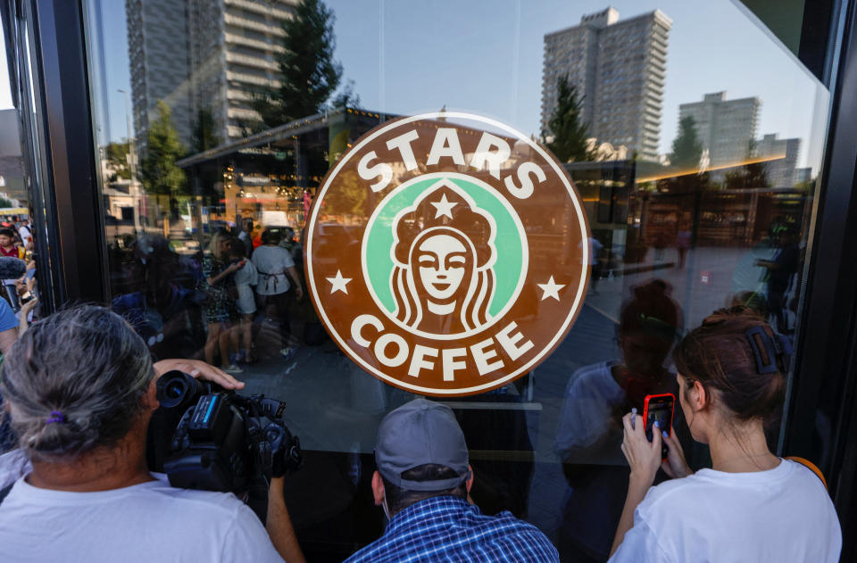 People gather for the launching of the new Stars coffee shop. 