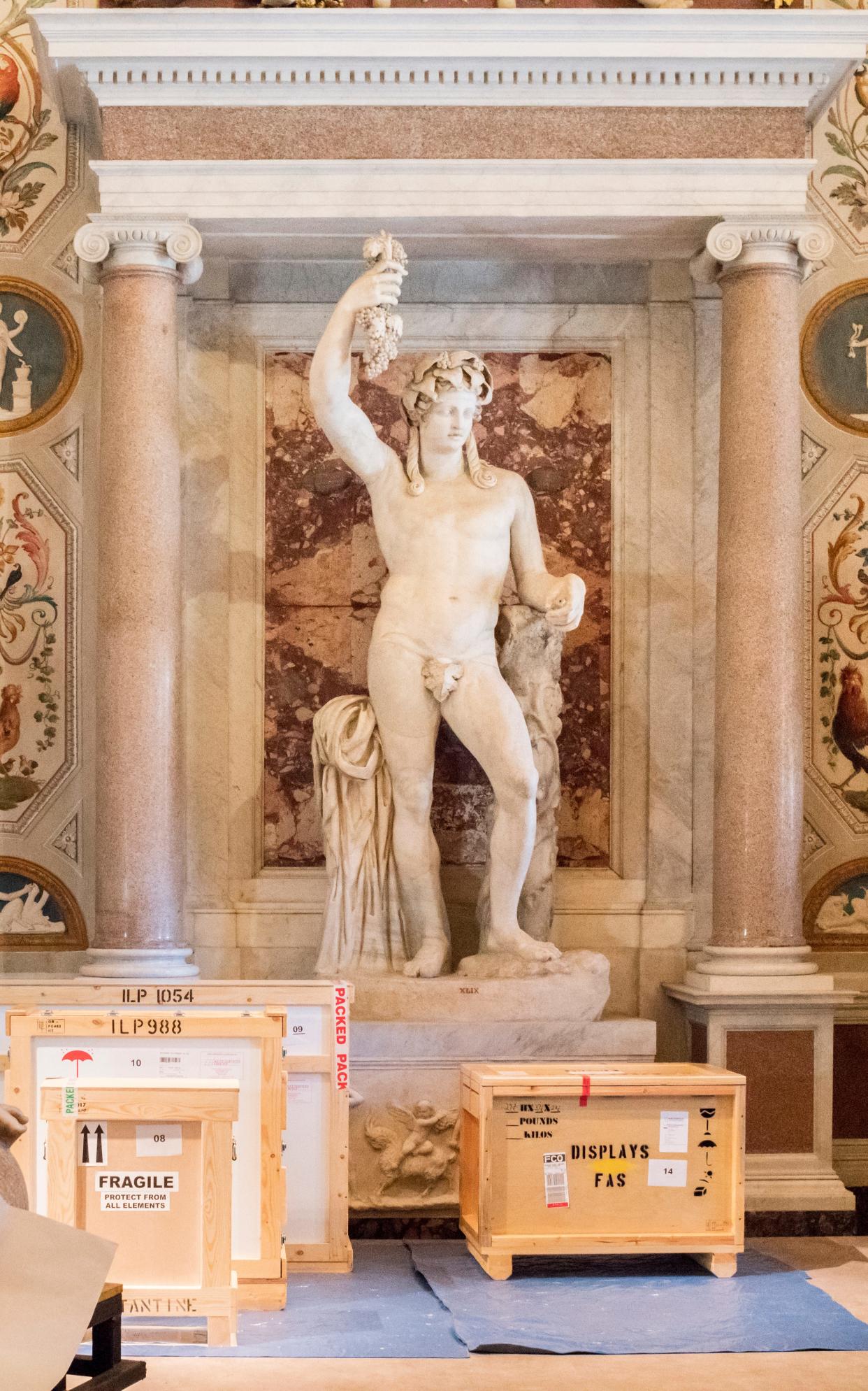 Bernini’s Truth Unveiled by Time (left) and sculptures still to be unpacked, in the Salone di Mariano Rossi, resplendent with marble relief - massimo siragusa