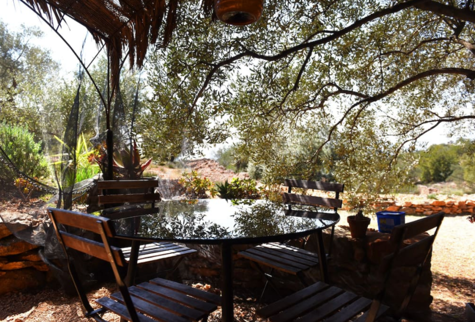 <p>This patio is perfect for dining al fresco. (Airbnb) </p>