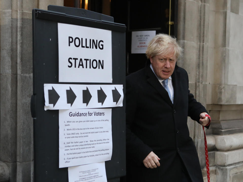 Prime Minister Boris Johnson leaves the polling station with his dog Dilyn after casting his vote in the 2019 General Election at Methodist Central Hall, London.