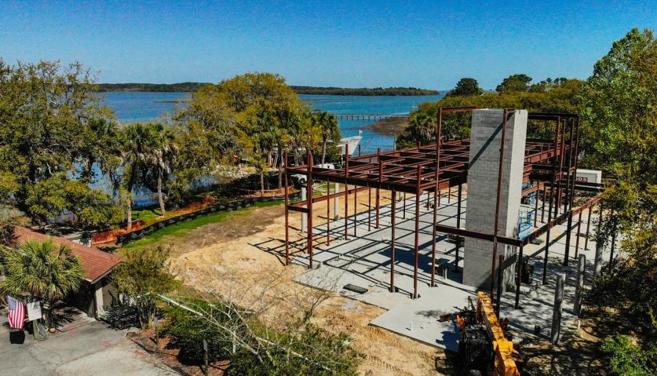 Construction of a new restaurant owned by Coastal Restaurants and Bars group is seen on Friday, March 24, 2023. The new restaurant, named Benny’s Coastal Kitchen, will have tremendous views of Skull Creek from its location off Squire Pope Road on Hilton Head Island. At lower left is the existing Benny Hudson Seafood Market.