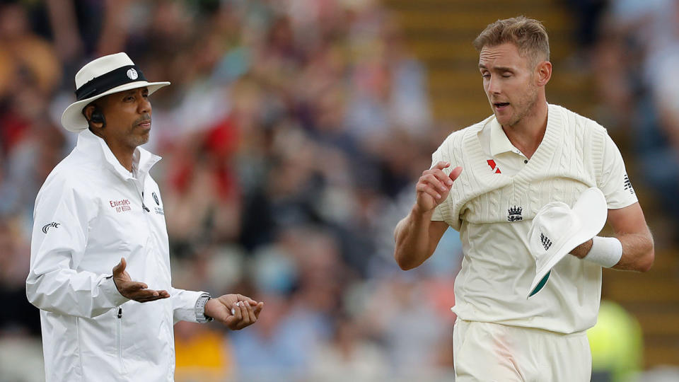 Joel Wilson takes part in a discussion with England's Stuart Broad. Pic: Getty