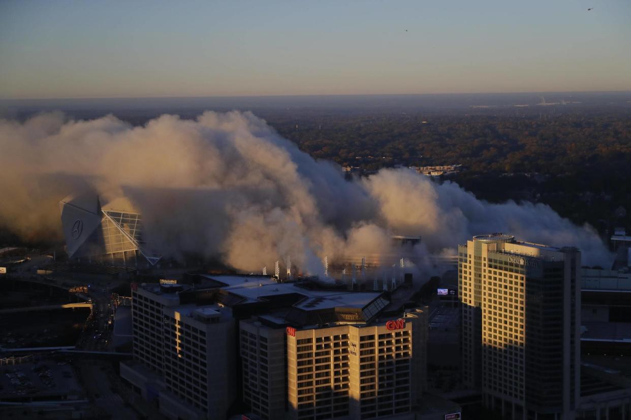 A view of the Georgia Dome implosion in Atlanta, Georgia: Kevin C. Cox/Getty Images