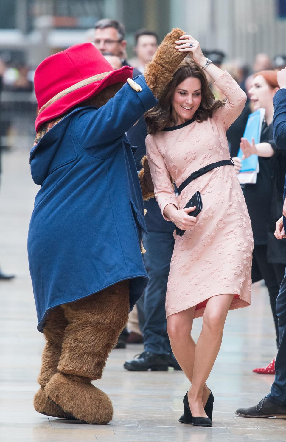 <p><strong>When: October 16, 2017</strong><br>Although the Duchess has been suffering from a severe form of morning sickness known as hyperemesis gravidarum, she was well enough to make this appearance alongside cast members of the movie ‘Paddington 2’. Rocking slightly shorter hair styled into glossy curls, Kate even danced with Paddington Bear himself!<br><em>[Photo: Getty]</em> </p>