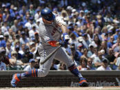 New York Mets' Pete Alonso hits a solo home run against the Chicago Cubs during the first inning of a baseball game in Chicago, Saturday, June 22, 2019. (AP Photo/Nam Y. Huh)