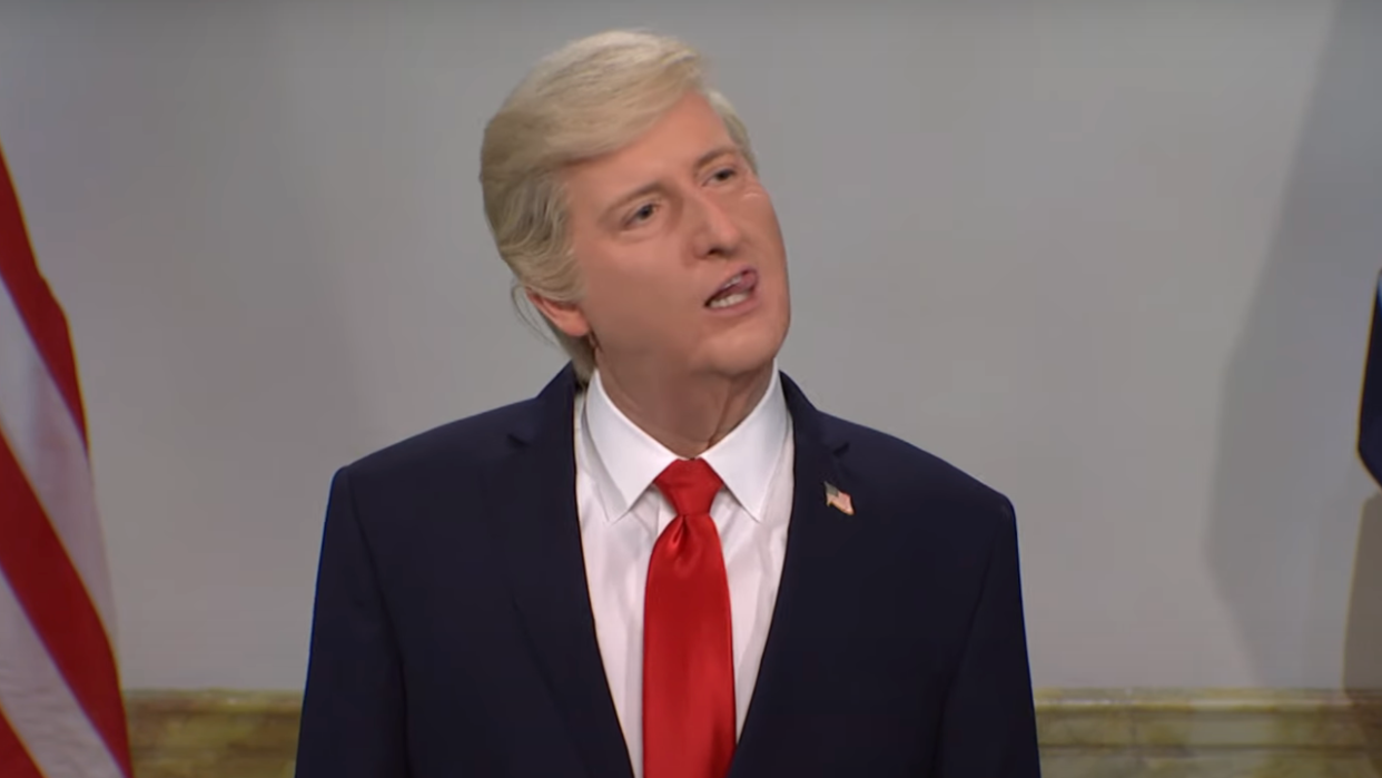  James Austin Johnson cocks his head to the side and sticks his tongue out during an impersonation of Donald Trump on SNL. 