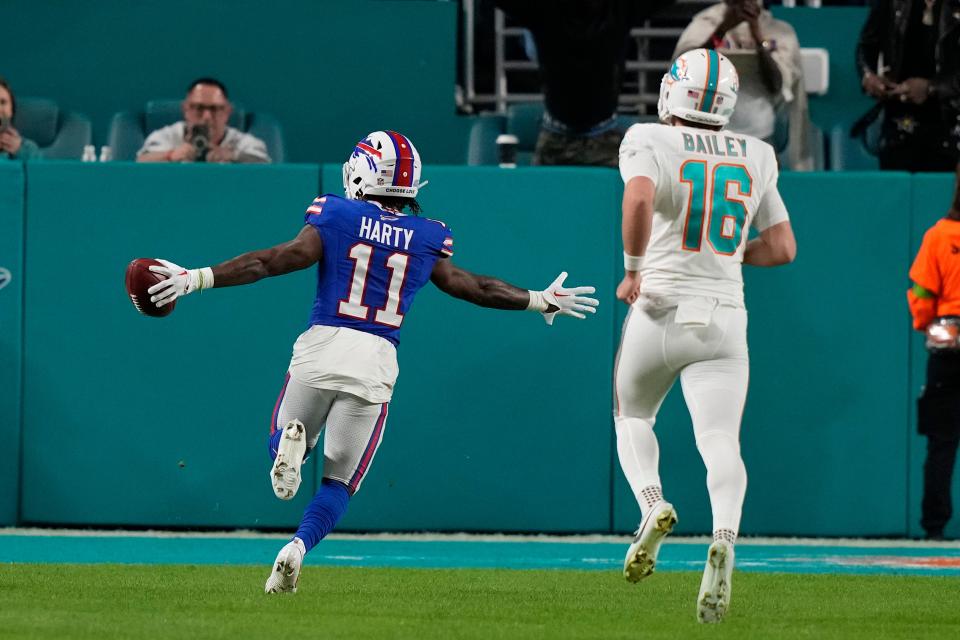 Buffalo Bills wide receiver Deonte Harty (11) runs for a touchdown during the second half of an NFL football game against the Miami Dolphins, Sunday, Jan. 7, 2024, in Miami Gardens, Fla. (AP Photo/Lynne Sladky)