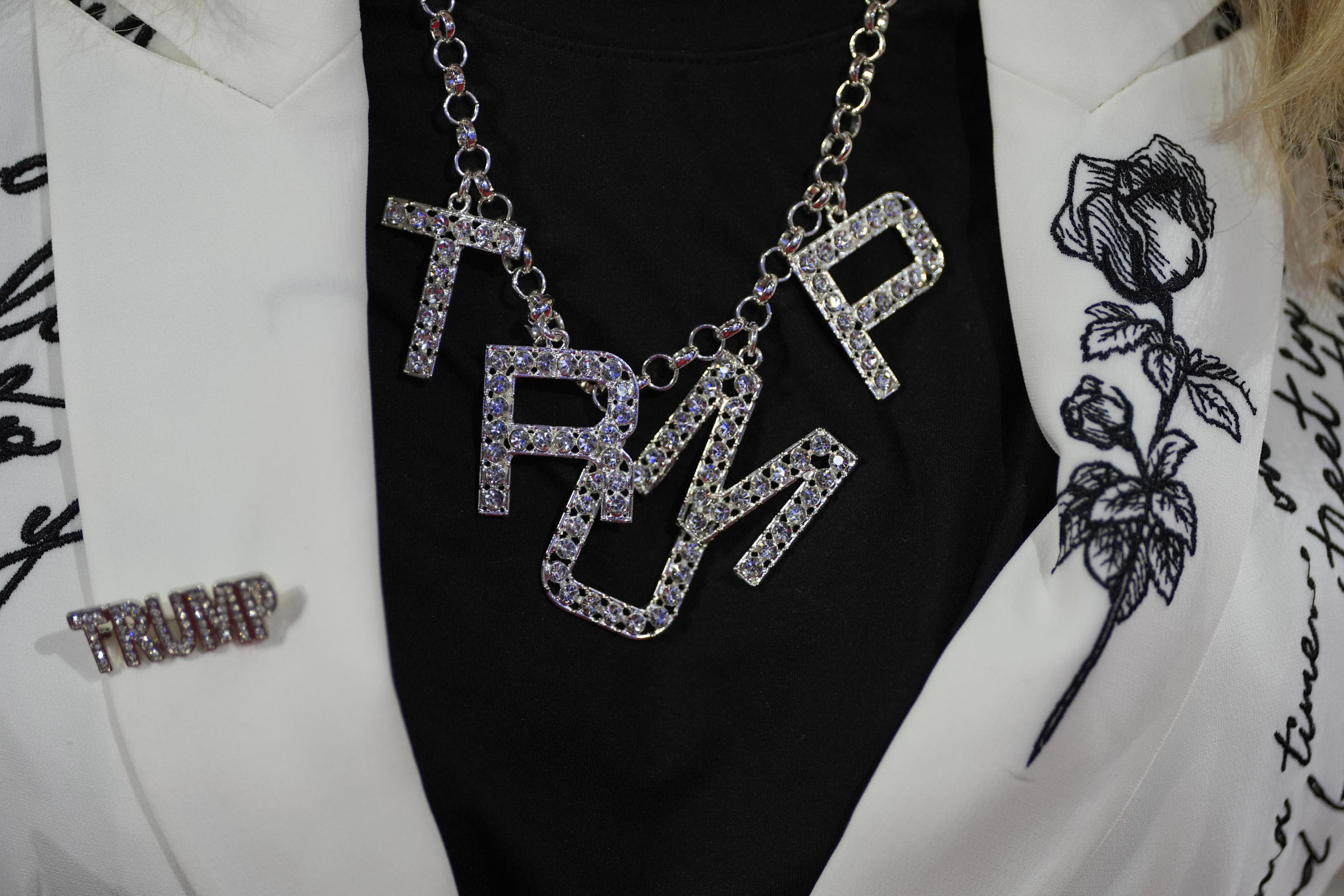 Florida delegate Michele Merrell arrives at the Republican National Convention Monday wearing a custom Trump necklace and pin. (Julia Nikhinson/AP)