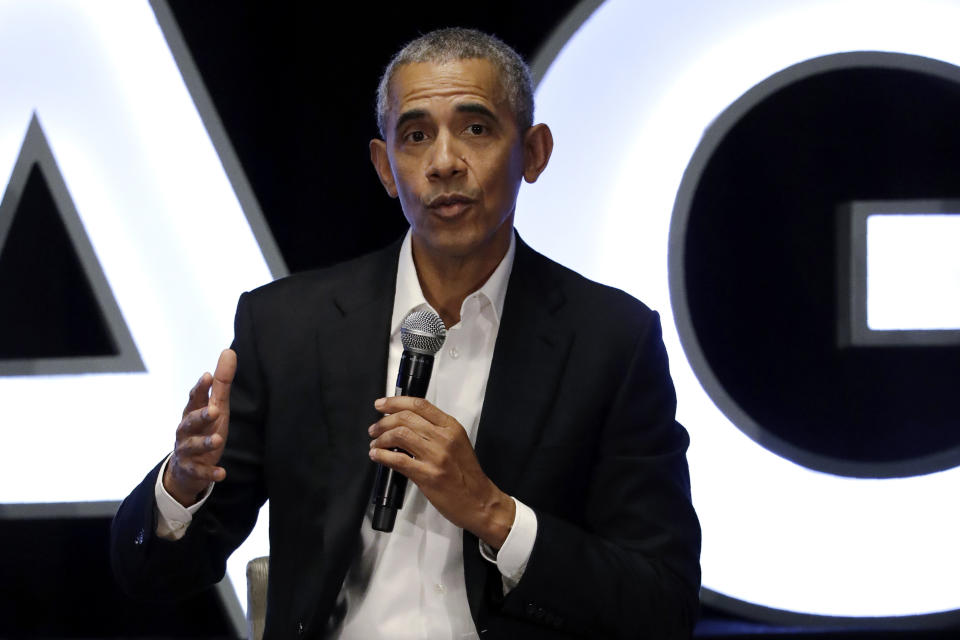 Former president Barack Obama talks during a panel with NBA players Chris Paul, Kevin Love and Giannis Antetokounmpo and sports analyst Michael Wilbon in Chicago on Saturday, Feb. 15, 2020. (AP Photo/Nam Y. Huh)