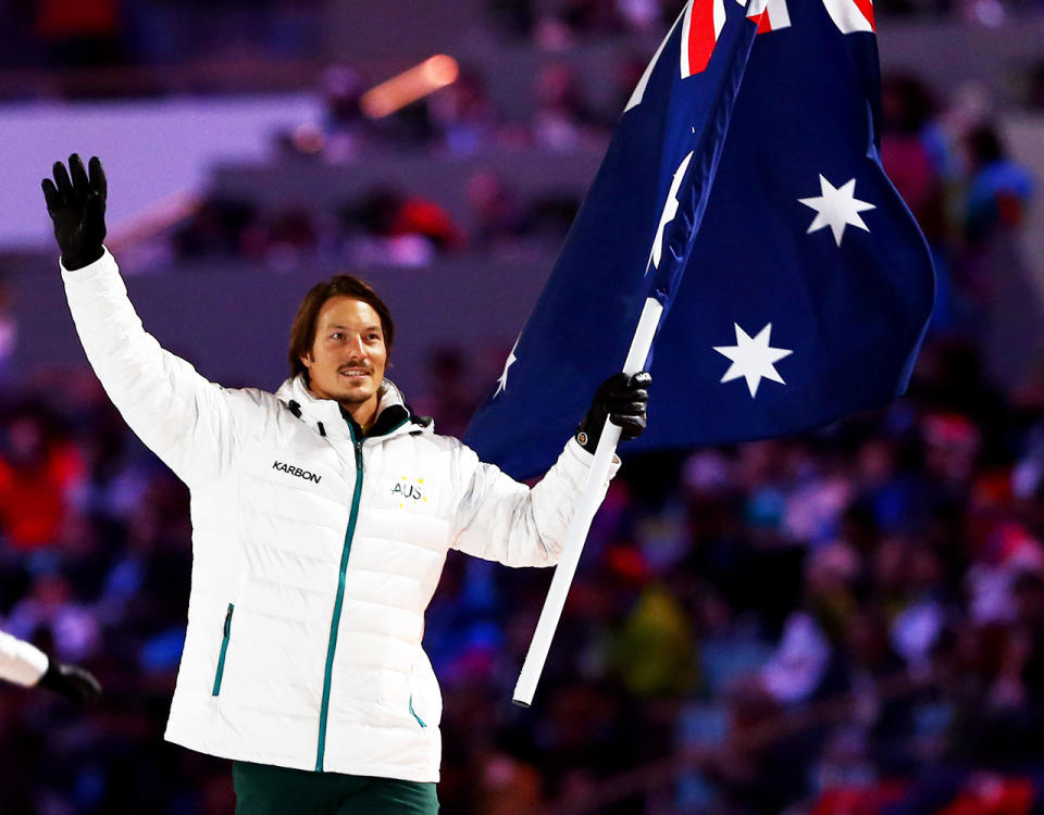 Alex 'Chumpy' Pullin, pictured here carrying the Australian flag at the Opening Ceremony of the 2014 Winter Olympics in Sochi.