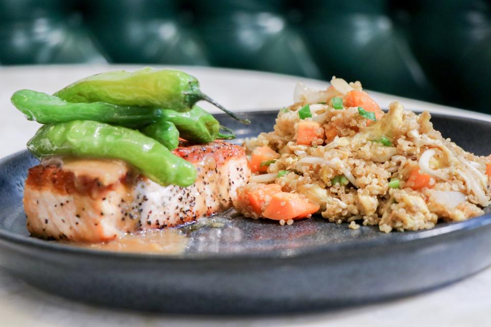 Pan-seared salmon is on the Restaurant Month menu at Oli's Fashion Cuisine restaurants in Wellington and Boca Raton.