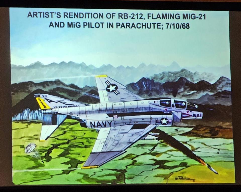 Captain USN (retired) Roy Cash provided an artist's rendition of the RB-212 plane he flew on July 10, 1968, when he shot down a MiG-21 over Vietnam during the 2023 Celebrating Our Veterans program hosted by the West Tennessee Veterans Coalition at Englewood Baptist Church.