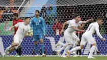 <p>Broken hearts: Egypt could not hold out, while Uruguay were relieved to convert one of their numberous chances. (AP) </p>