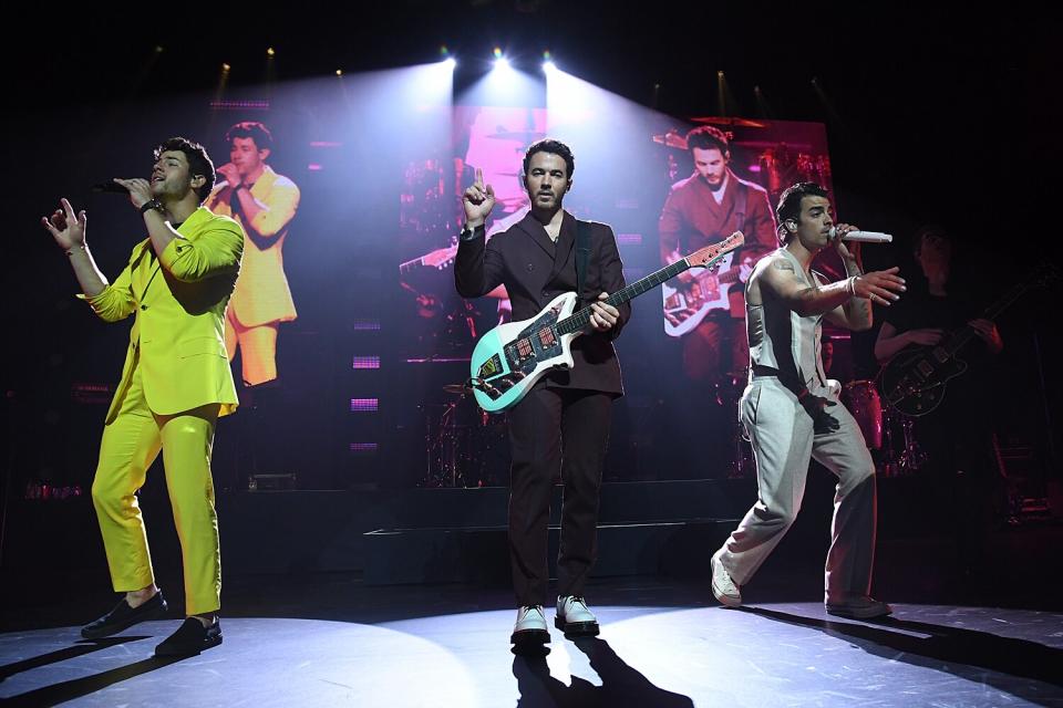 Nick Jonas, Kevin Jonas and Joe Jonas perform onstage