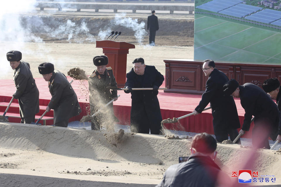 In this photo provided by the North Korean government, North Korean leader Kim Jong Un, center, participates in groundbreaking ceremonies for new housing and farming projects in Pyongyang, North Korea Wednesday, Feb. 15, 2023. Independent journalists were not given access to cover the event depicted in this image distributed by the North Korean government. The content of this image is as provided and cannot be independently verified. Korean language watermark on image as provided by source reads: "KCNA" which is the abbreviation for Korean Central News Agency. (Korean Central News Agency/Korea News Service via AP)
