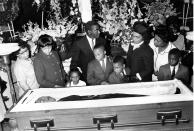 <p>Coretta Scott King and her four children view the body of her husband. (Photo: AP) </p>