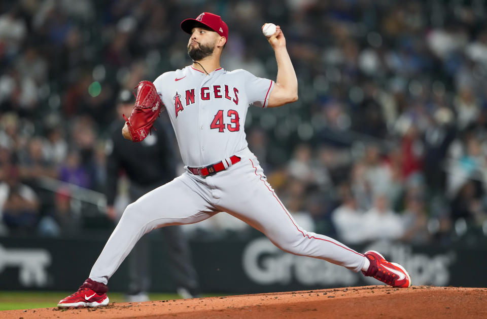 Los Angeles Angels starting pitcher Patrick Sandoval throws against the Seattle Mariners during the first inning of a baseball game, Tuesday, Sept. 12, 2023, in Seattle. (AP Photo/Lindsey Wasson)