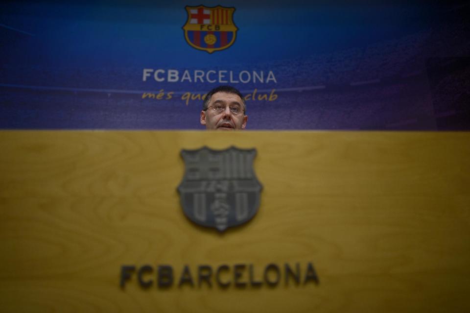 FC Barcelona's president Josep Maria Bartomeu speaks during a press conference at the Camp Nou stadium in Barcelona, Spain, Thursday, April 3, 2014. Barcelona has been "the victim of a grave injustice" after being hit with a FIFA transfer ban, he said on Thursday as the Spanish champion vowed not to change its model for recruiting youth players. Josep Maria Bartomeu told a news conference the club has never broken any Spanish regulations in signing young talents to its famed La Masia academy, which has produced such players as Lionel Messi, Xavi Hernandez, and Andres Iniesta. (AP Photo/Manu Fernandez)