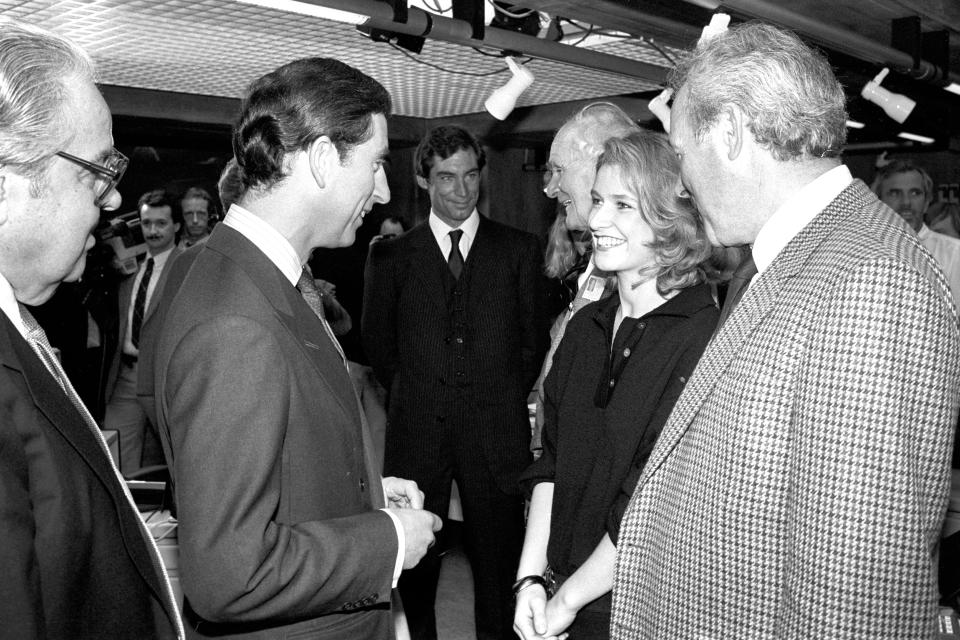 The Prince of Wales meets actress Caroline Bliss, 25, at Pinewood Studios. She plays Miss Moneypenny in the new James Bond film The Living Daylights.