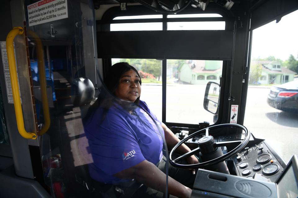 Priscilla Barcous drives the WeGo bus around Nashville downtown on West End Avenue, Tuesday, May 3, 2022. 