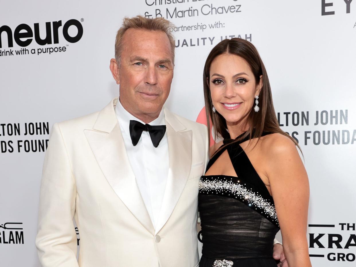 Kevin Costner and Christine Baumgartner at the Elton John AIDS Foundation's 30th Annual Academy Awards Viewing Party on March 27, 2022 in West Hollywood, California.
