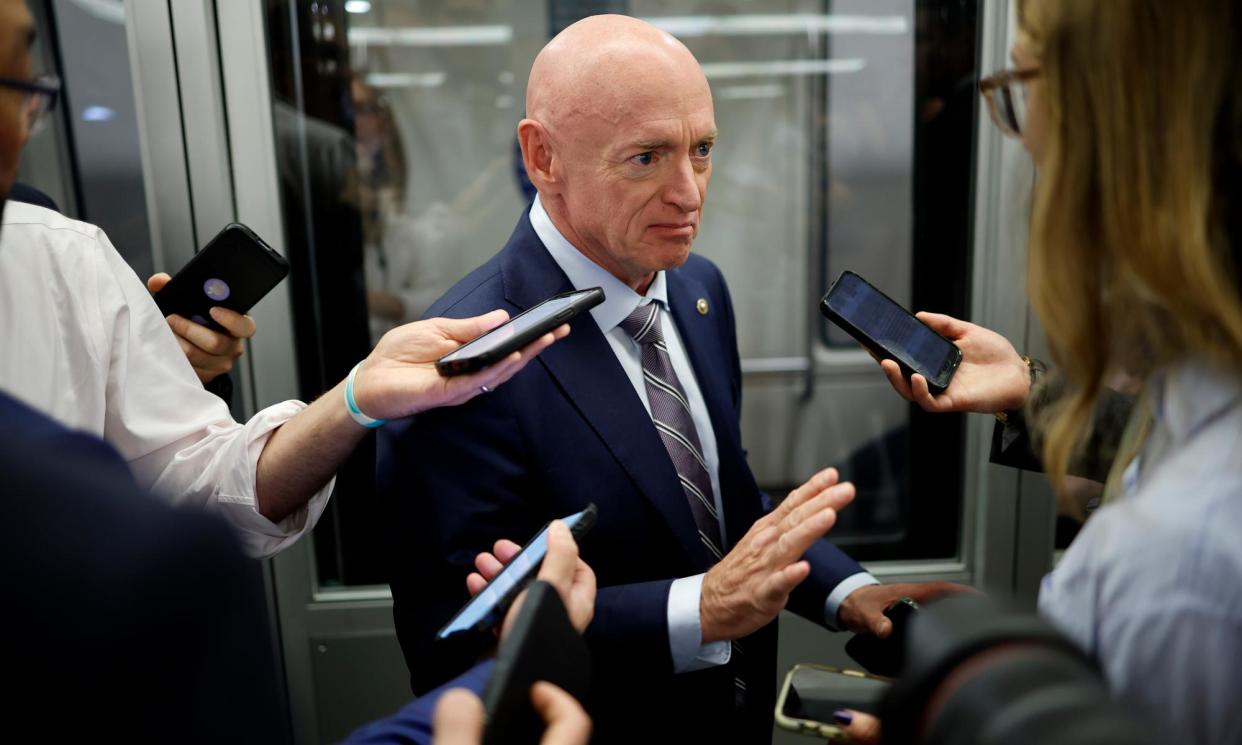 <span>Senator Mark Kelly, Democrat from Arizona, speaks to reporters at the US Capitol on Wednesday.</span><span>Photograph: Kevin Dietsch/Getty Images</span>