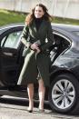 <p>As Middleton stepped out to visit various community projects in Edinburgh, she paired her black turtleneck with a deep green coat, cinched at the waist with a skinny belt.</p>