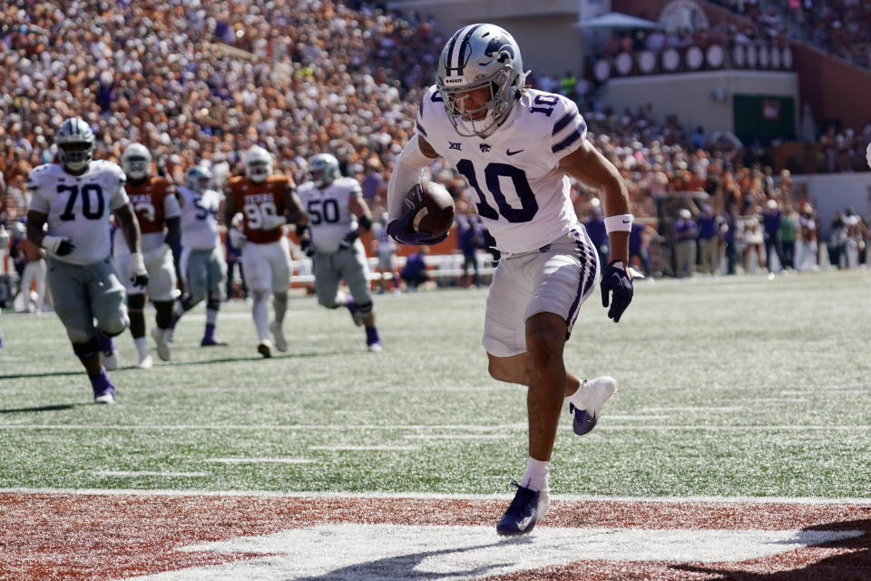 Kansas State wide receiver Keagan Johnson (10) scores on a touchdown catch against Texas during the second half of an NCAA college football game in Austin, Texas, Saturday, Nov. 4, 2023. (AP Photo/Eric Gay)