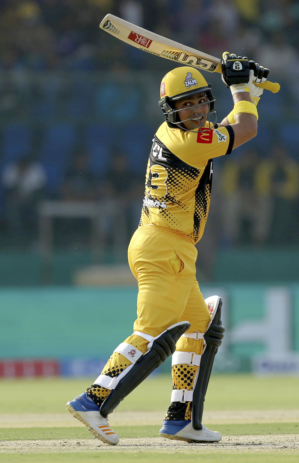 Peshawar Zalmi's Kamran Akmal bats during the Pakistan Super League T20 cricket match between Quetta Gladiators and Peshawar Zalmi at National stadium in Karachi, Pakistan, Saturday, Feb. 22, 2020. (AP Photo/Fareed Khan)