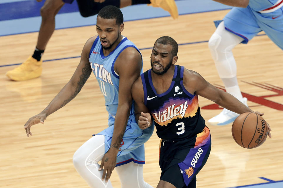 Phoenix Suns guard Chris Paul (3) collides with Houston Rockets guard Sterling Brown during the second half of an NBA basketball game Wednesday, Jan. 20, 2021, in Houston. (AP Photo/Michael Wyke)