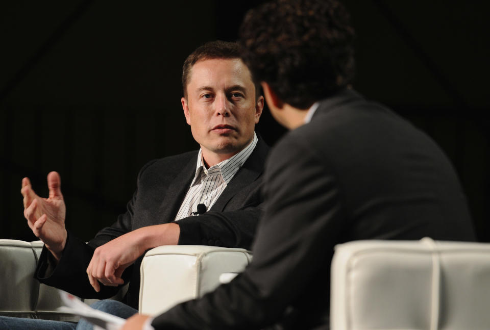 SAN FRANCISCO, CA - SEPTEMBER 14:  CEO & CTO of Space Exploration Technologies, Co-Founder & CEO of Tesla Motors Elon Musk (L) and TechCrunch Co-Editor Erick Schonfeld speak onstage at Day 3 of TechCrunch Disrupt SF 2011 held at the San Francisco Design Center Concourse on September 14, 2011 in San Francisco, California.  (Photo by Araya Diaz/Getty Images for TechCrunch)