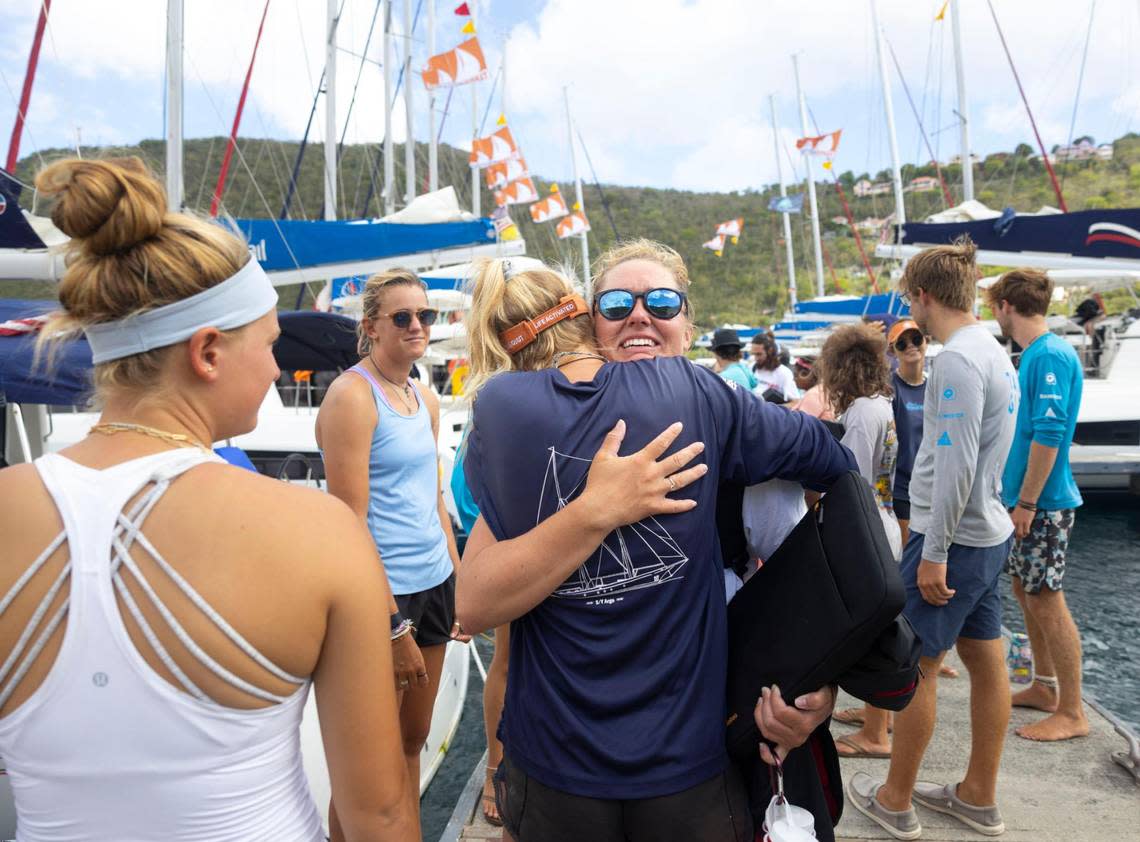 Dive instructor Jessica Stich, from Pembroke Pines, hugs Dive Director Sydnei Rubin, alumni from the University of Miami, at the end of a session before Stich leaves on Friday, July 29, 2022 in Soper’s Hole, West End, the British Virgin Islands.