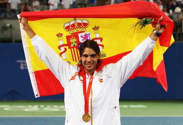 Rafael Nadal of Spain celebrates winning the gold medal against Fernando Gonzalez of Chile during the men's singles gold medal tennis match held at the Olympic Green Tennis Center during Day 9 of the Beijing 2008 Olympic Games on August 17, 2008 in Beijing, China. (Getty Images)