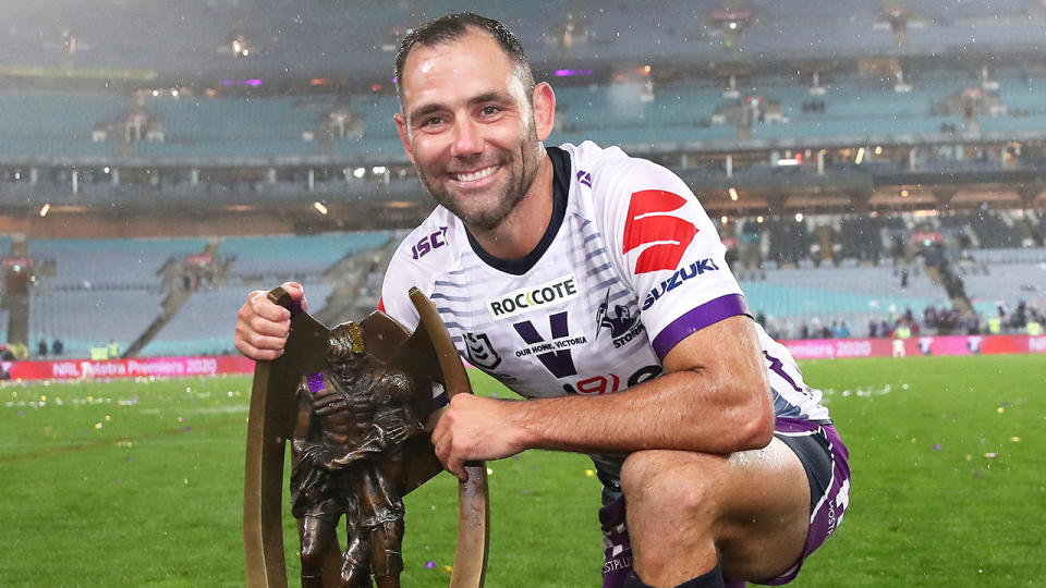 Cameron Smith (pictured) with the NRL premiership trophy.