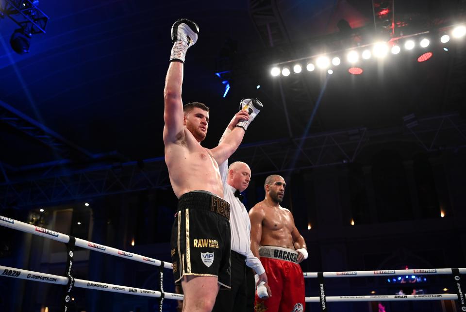 Johnny Fisher celebrates his points victory over Gabriel Enguema (Getty Images)