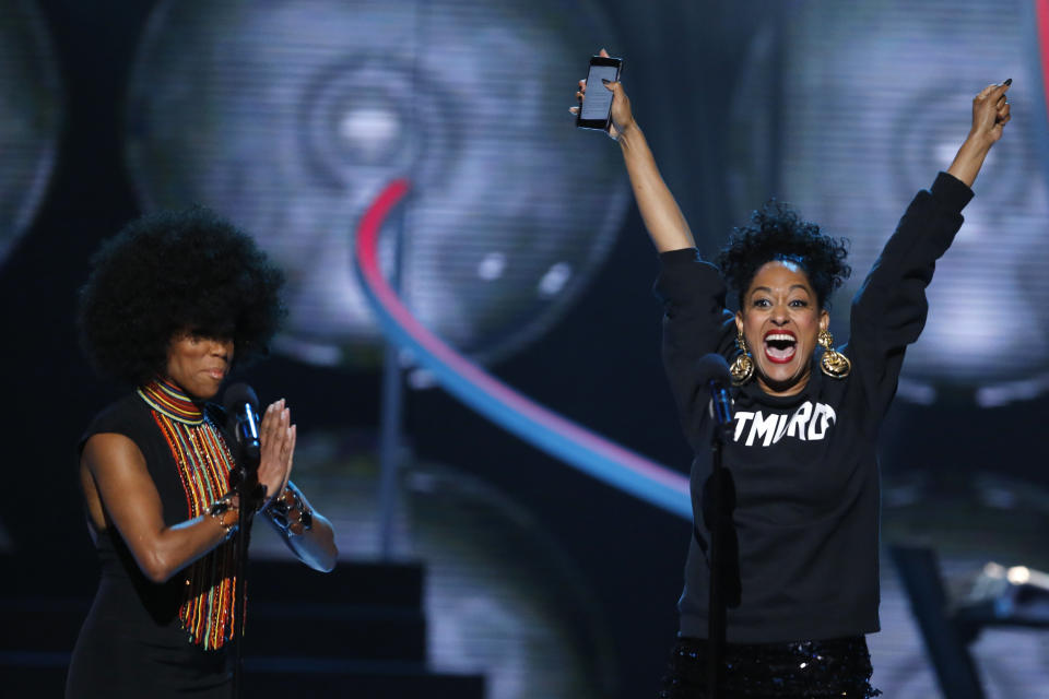 Hosts Regina King, left, and Tracee Ellis Ross speak during a taping of the Black Girls Rock award ceremony at the New Jersey Performing Arts Center, Saturday, March 28, 2015, in Newark, N.J. (AP Photo/Julio Cortez)